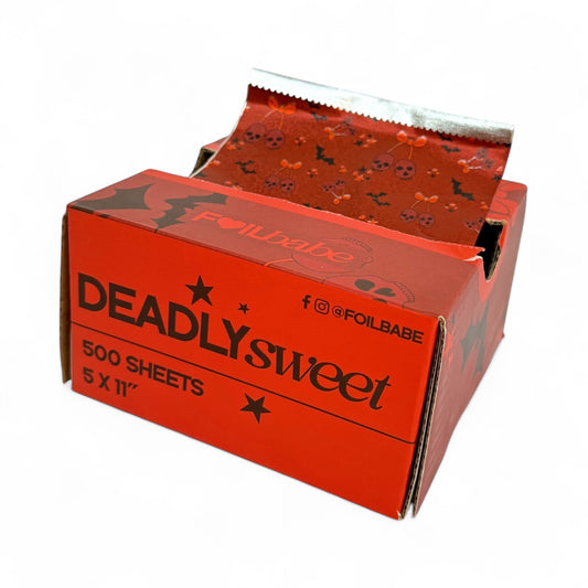 Box of 'Deadly Sweet' foil sheets with Halloween-themed design on a white background